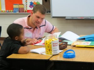 An MAT student teaching a single student