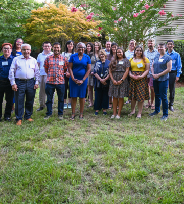 President Jordan in a group photo outside with New Faculty and the Executive Council